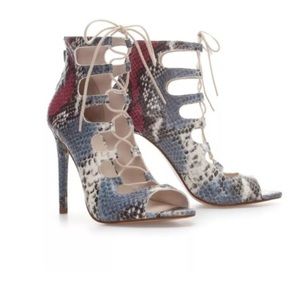 Snake skinned lace up heels