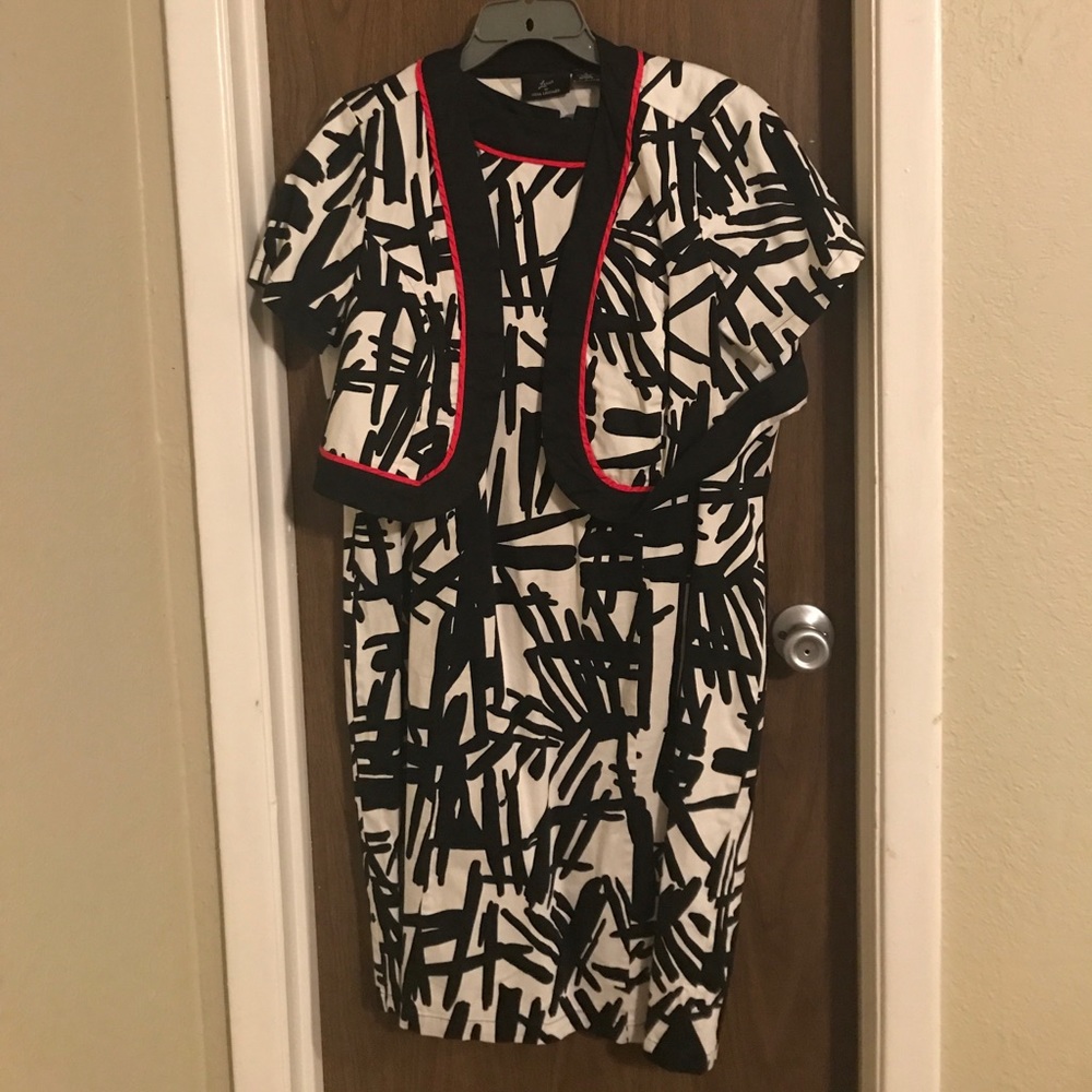 Black, white and red dress suit