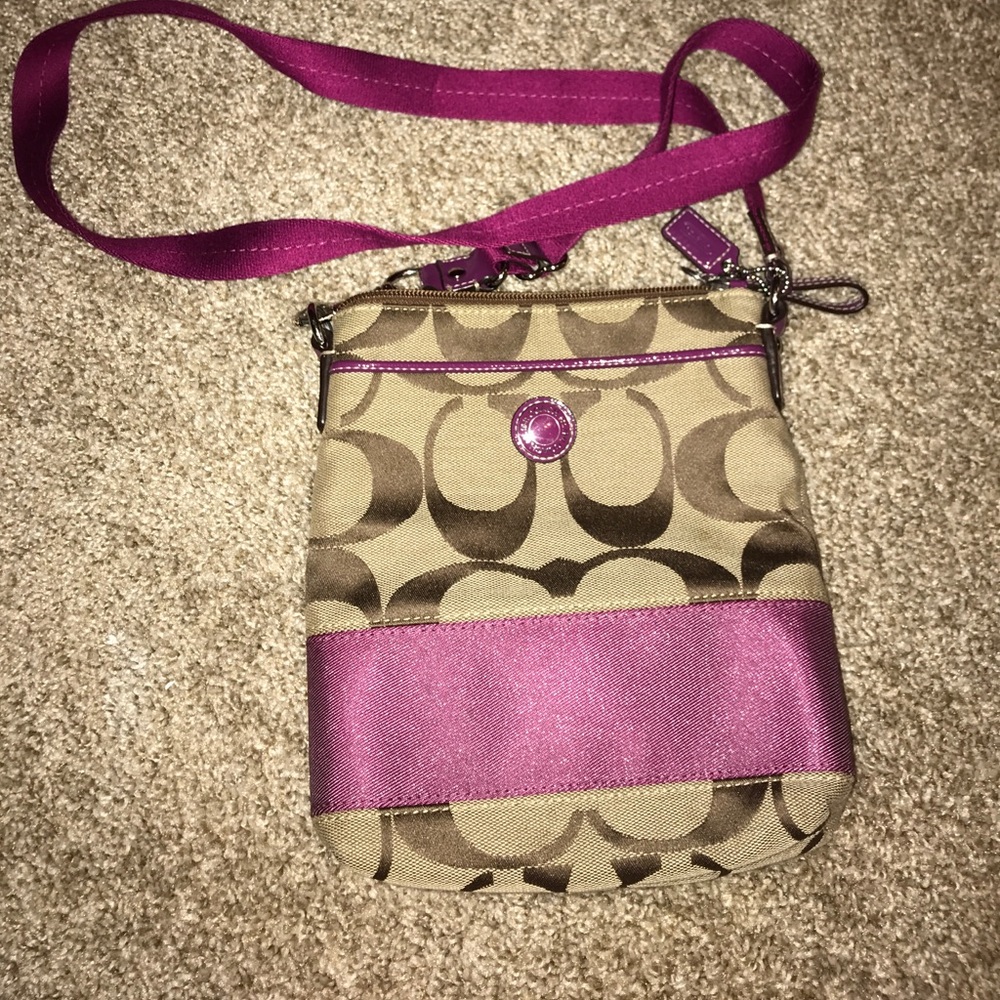 dark pink/purple Coach crossbody purse