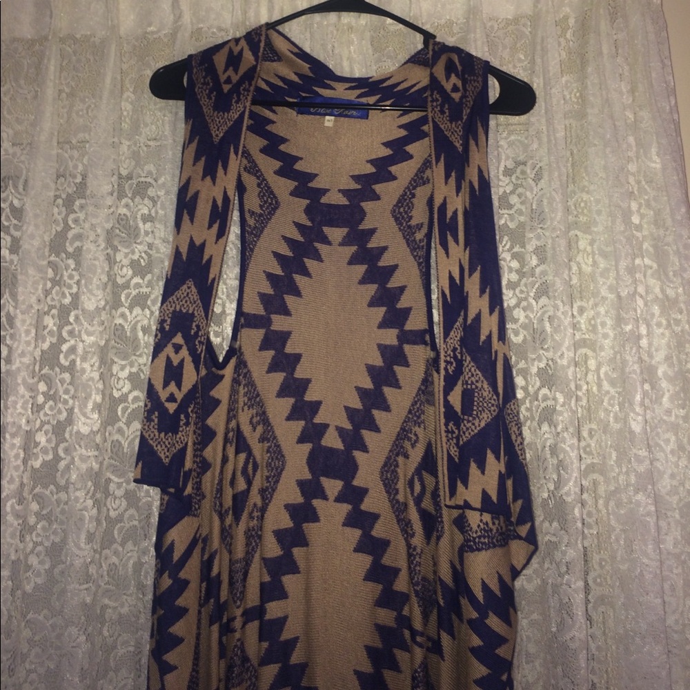 Francesca's Blue and tan tribal sweater vest