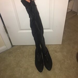 Over the knee studded boots