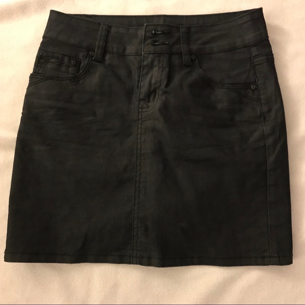 Mini skirt with slightly shimmery black fabric