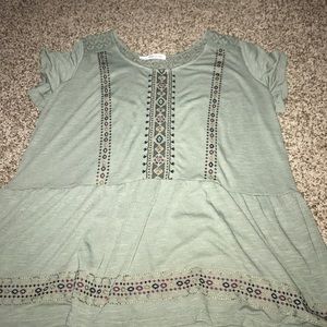 Light green and tribal pattern