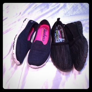 Two pairs of sketchers memory foam slide inside