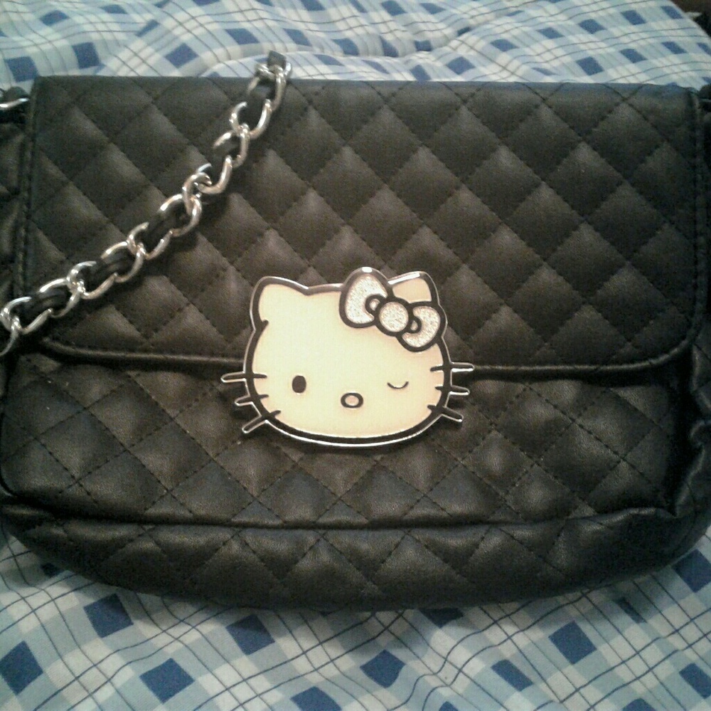 Hello kitty clutch purse.