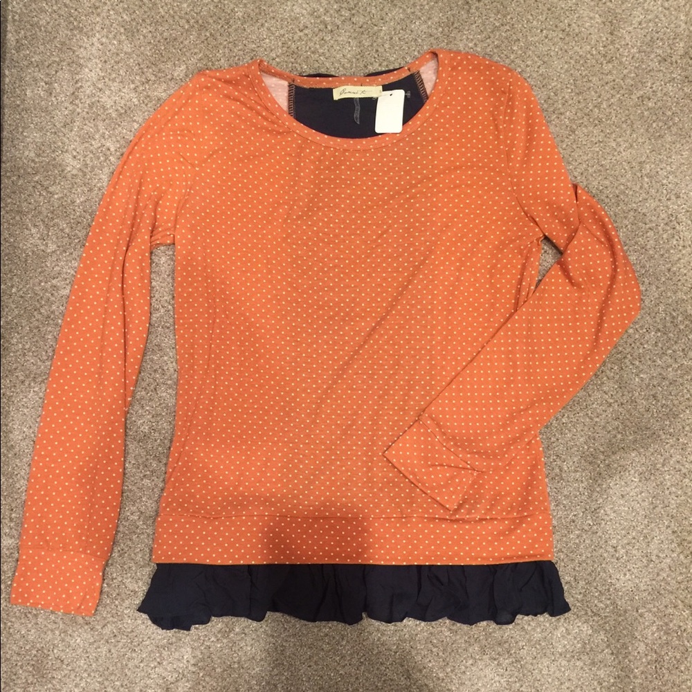 Long sleeve extremely cute top.