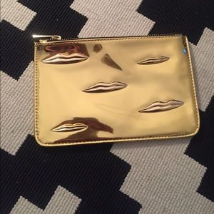 Gold Limited Edition NARS x Man Ray Lip Clutch