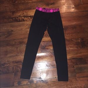 Plain black leggings with pink PINK logo at top