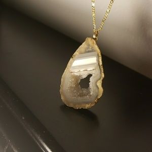 Beautiful gold lined geode pendant
