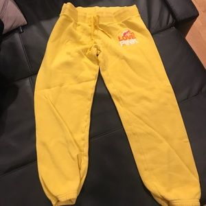 Bright yellow cropped sweatpants