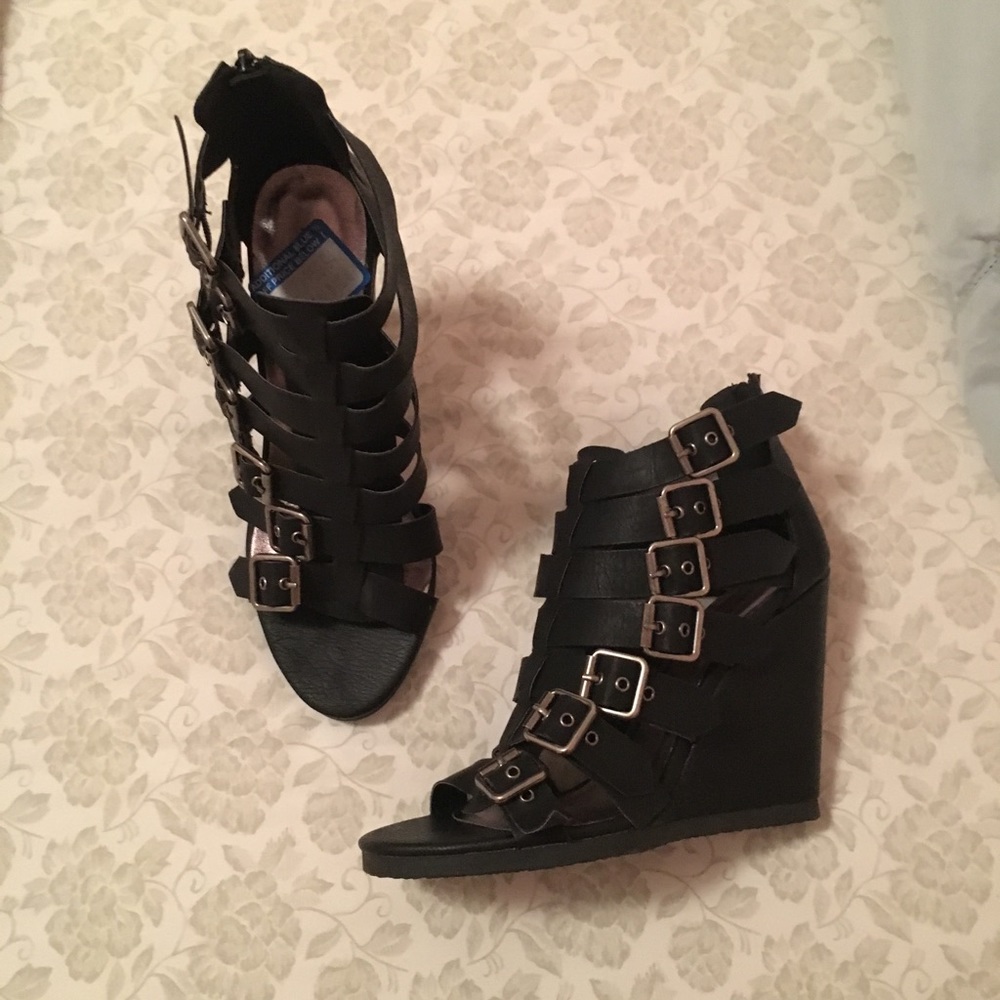 Buckled strappy black wedges