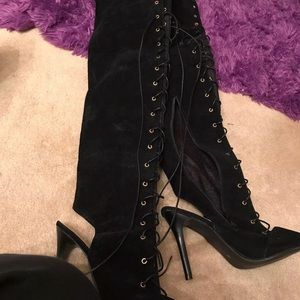 Thigh high lace up boots