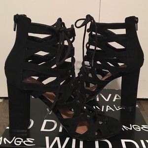 Lace up black booties by Wild Diva!