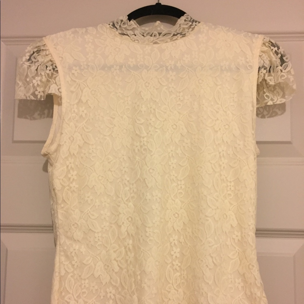 Cream-colored lace top