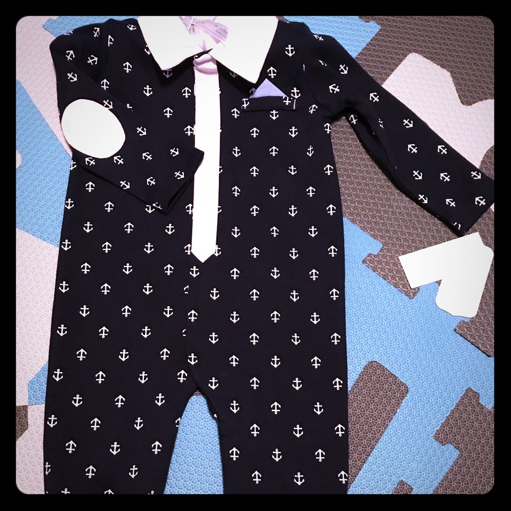 One piece navy and white body suite with anchor