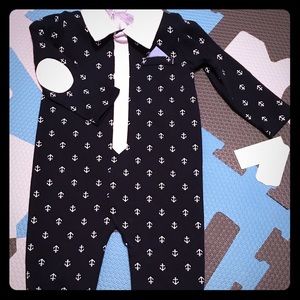 One piece navy and white body suite with anchor