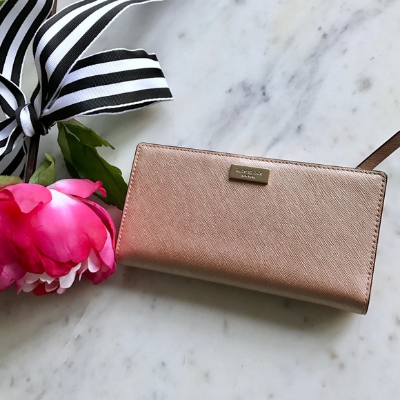 kate spade Handbags - NWT Kate Spade Rose Gold Wallet