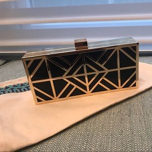 Tory Burch navy and gold clutch. W/ dust bag