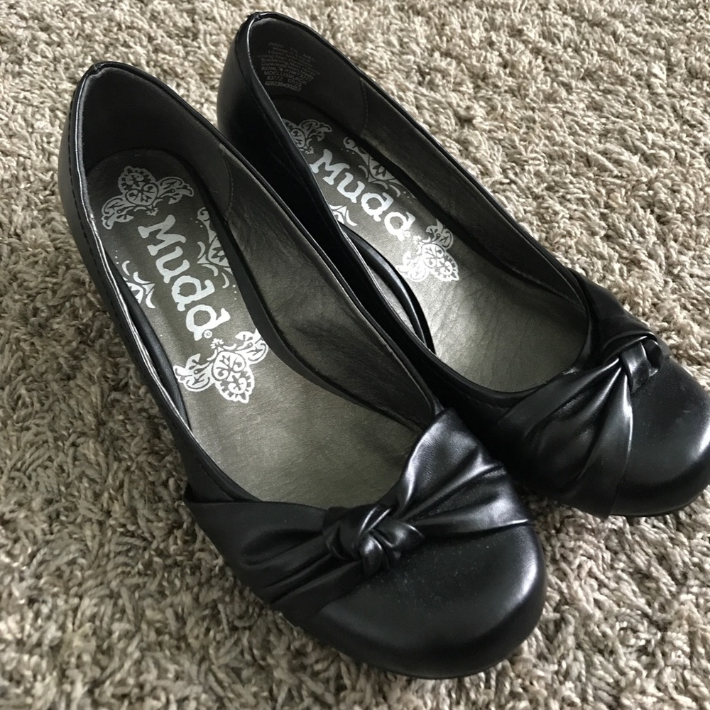 Black Mudd wedge heels