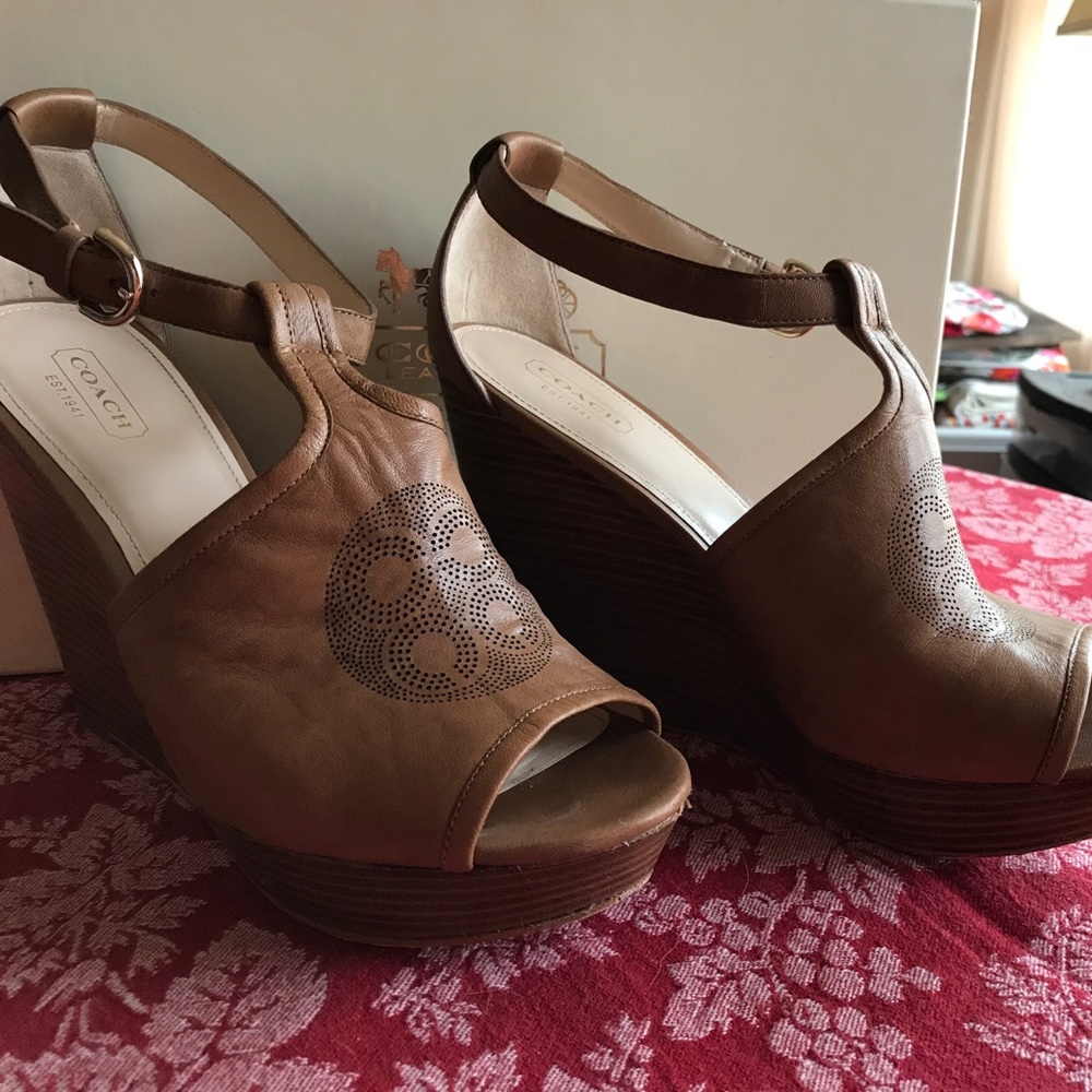 Coach leather monogrammed platform shoes.