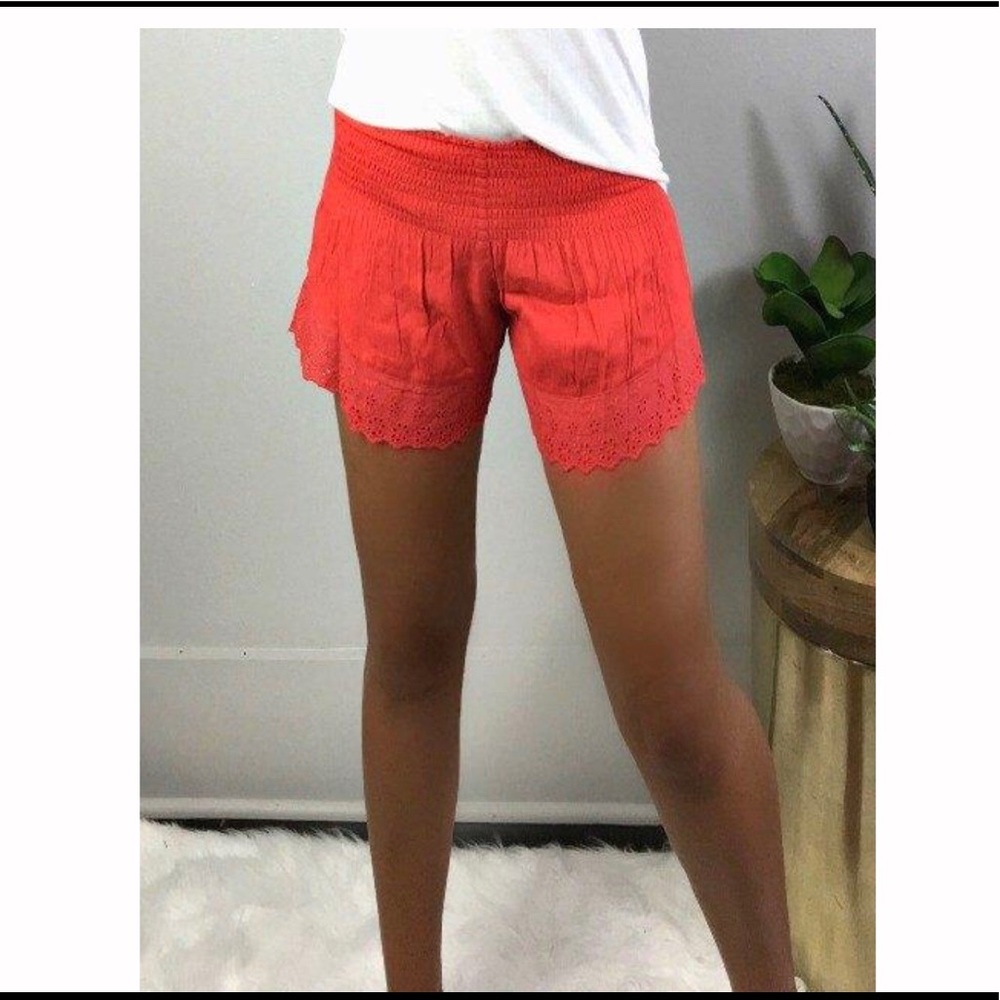 Red eyelet shorts