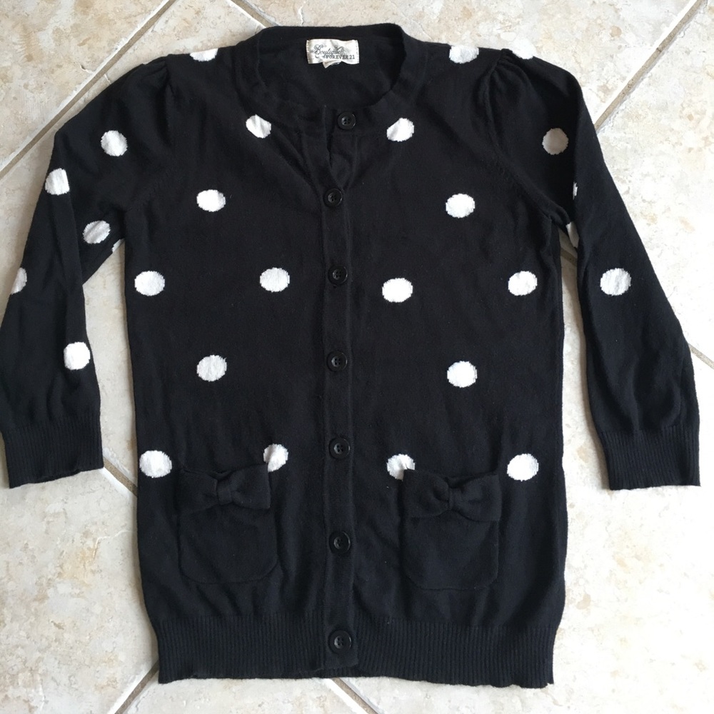 Black cardigan with white polka dots
