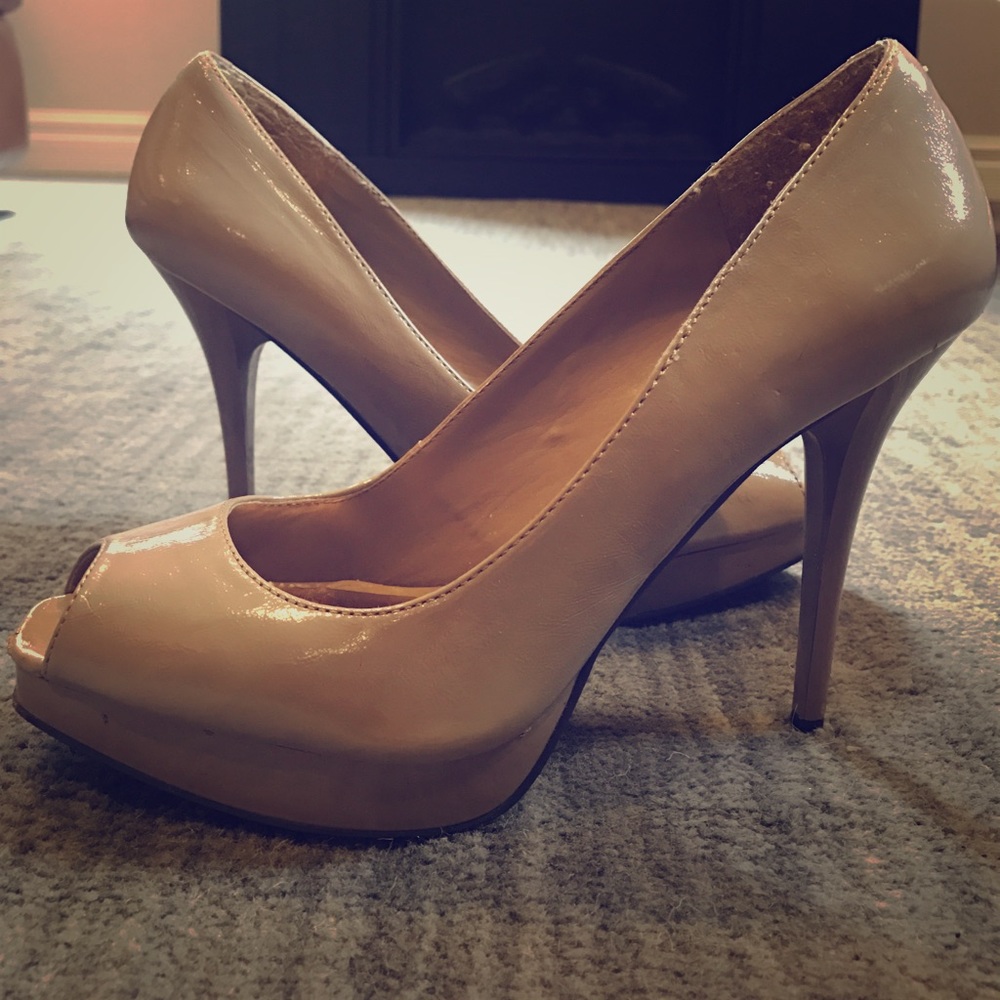 Patent leather nude heels.
