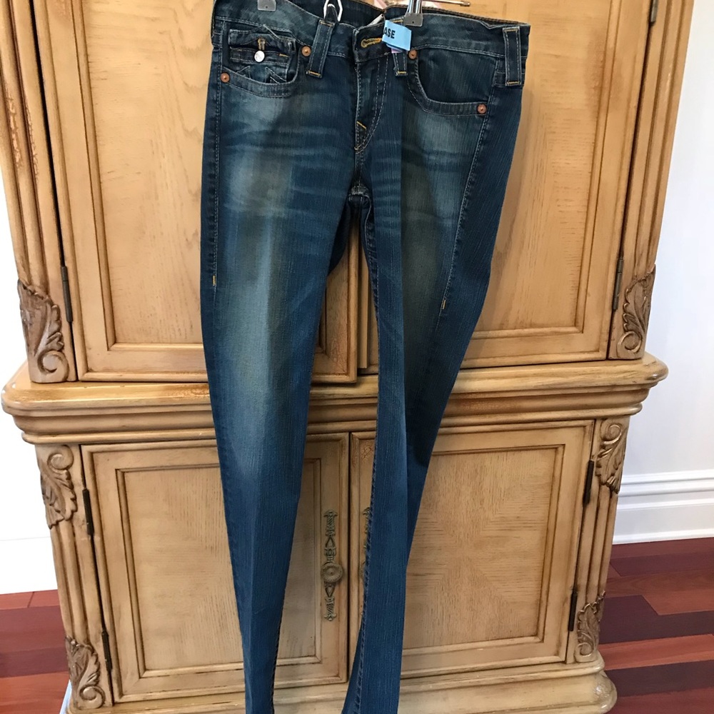 Many pairs of true religion jeans