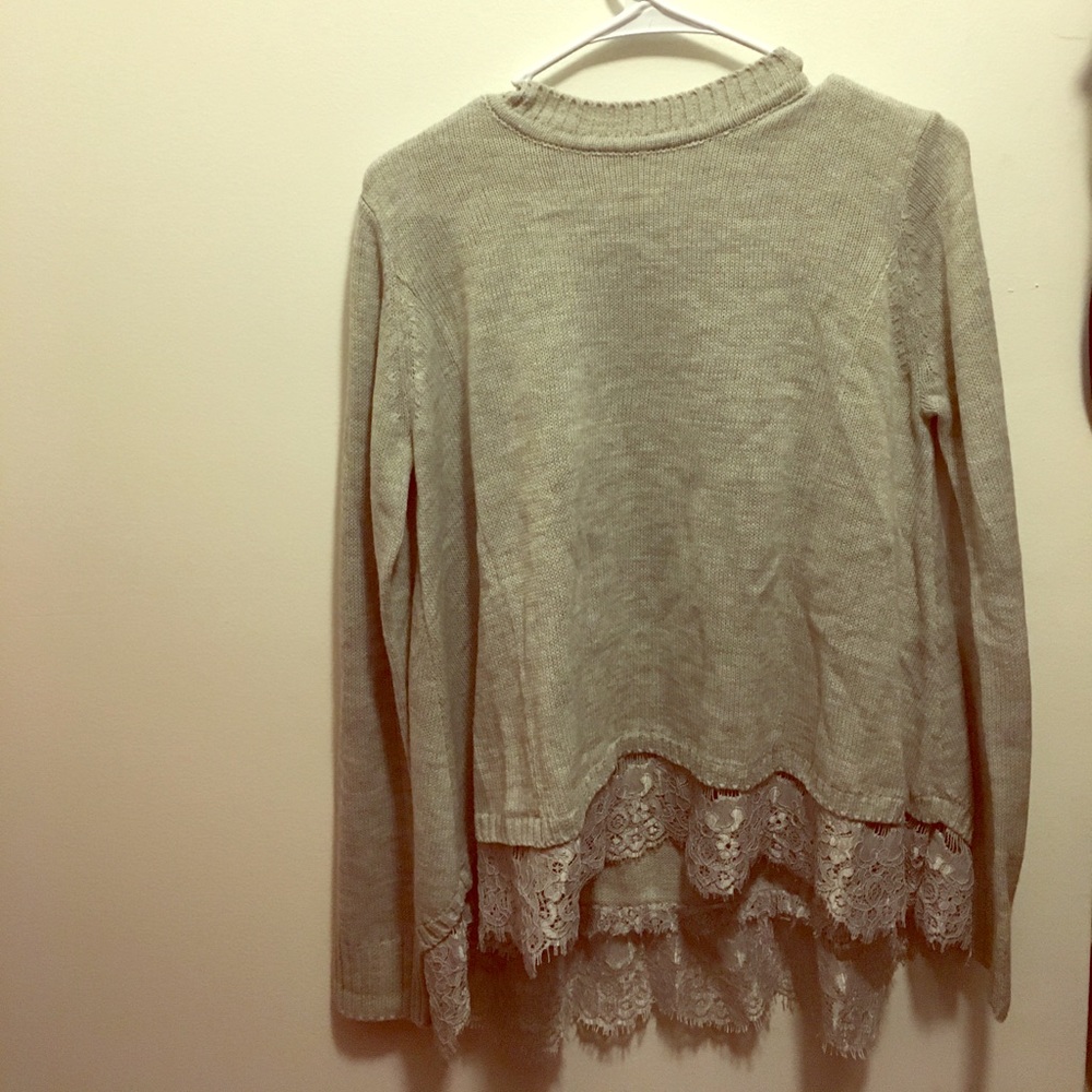 Sweater with lace underlay