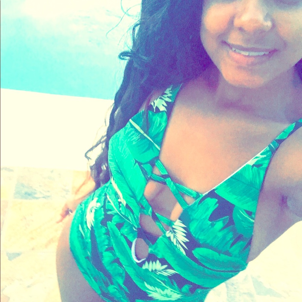 Green and black baiting suit
