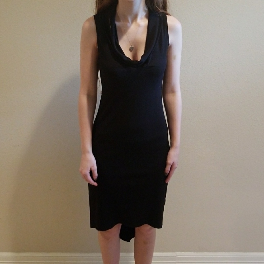 High low. Sleeveless. Cowl neck. Black dress