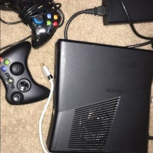 Xbox 360 with two controllers