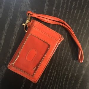 Used orange Tory burch credit card/ID holder