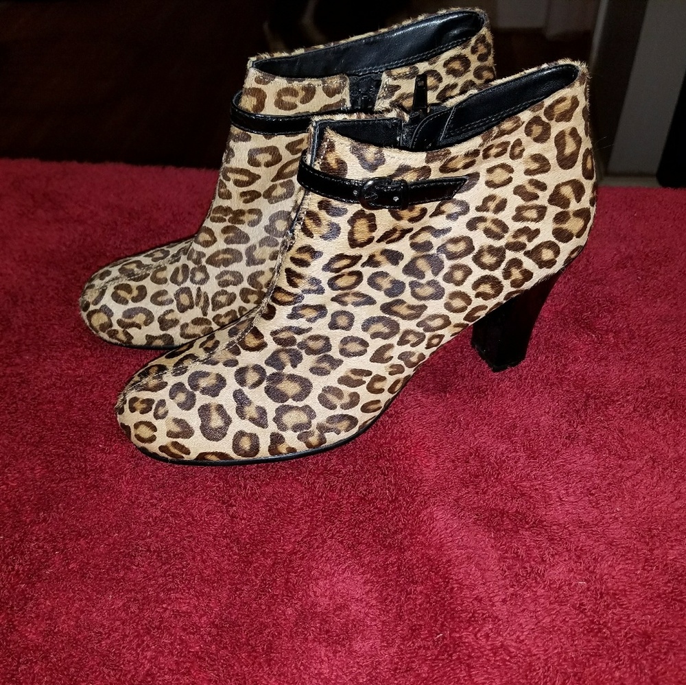 Leopard calf hair booties.