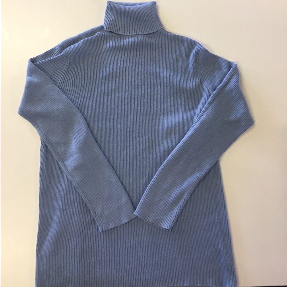 Mimi’s maternity blue sweater