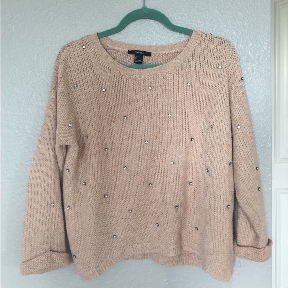 Knitted sweater with rhinestones
