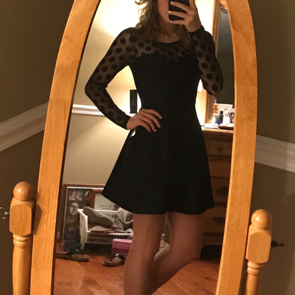Long sleeved black party dress with polka dot mesh