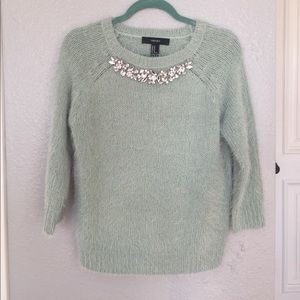 Fuzzy sweater with rhinestones