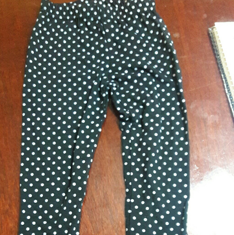 Black and white polkadot pants with pink bow