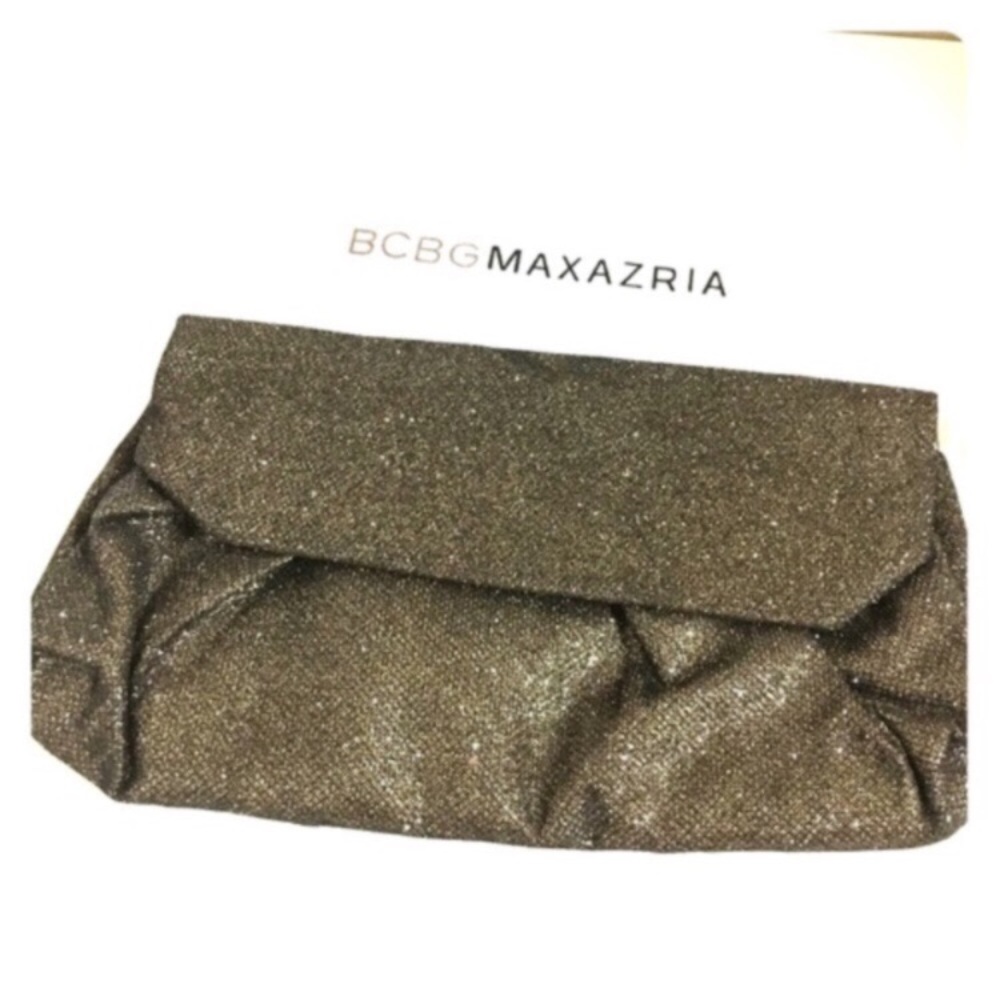 Beautiful Gold BCBG clutch