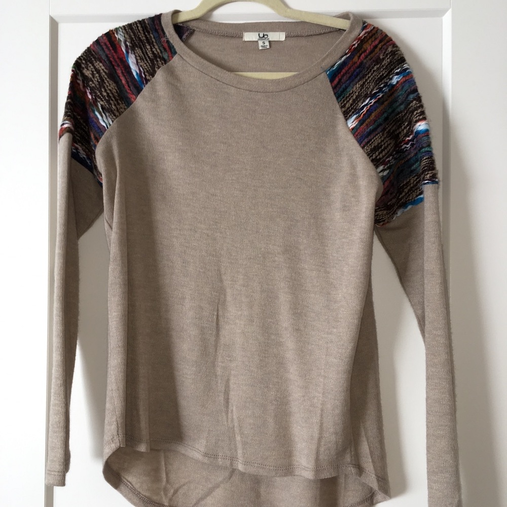 a “Ya Los Angeles” small brown sweater