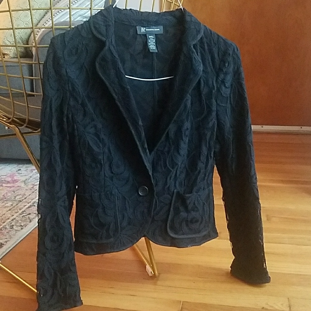 Black blazer with a lace overlay.