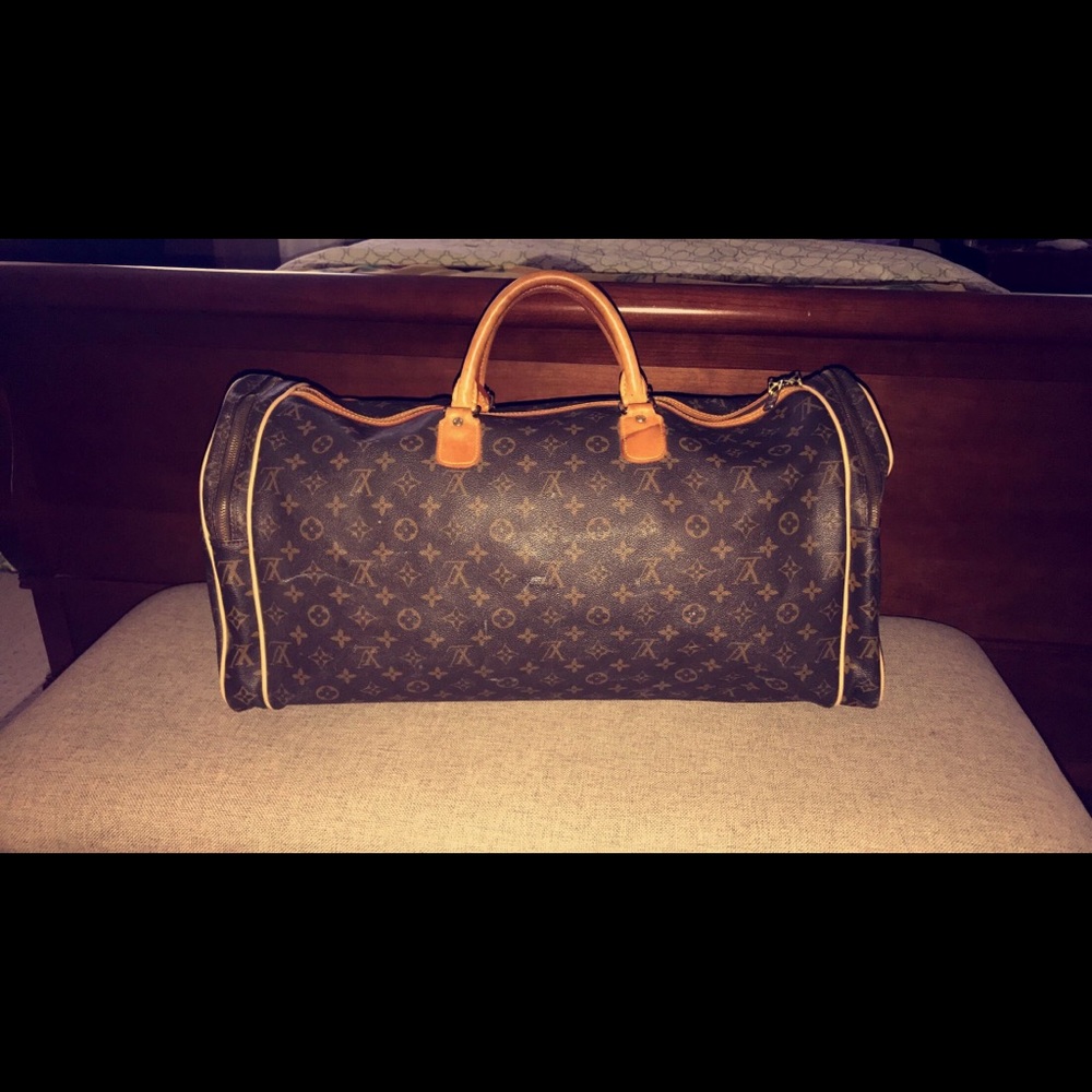 Louis Vuitton duffle bag.