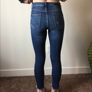 High waisted distressed jeans