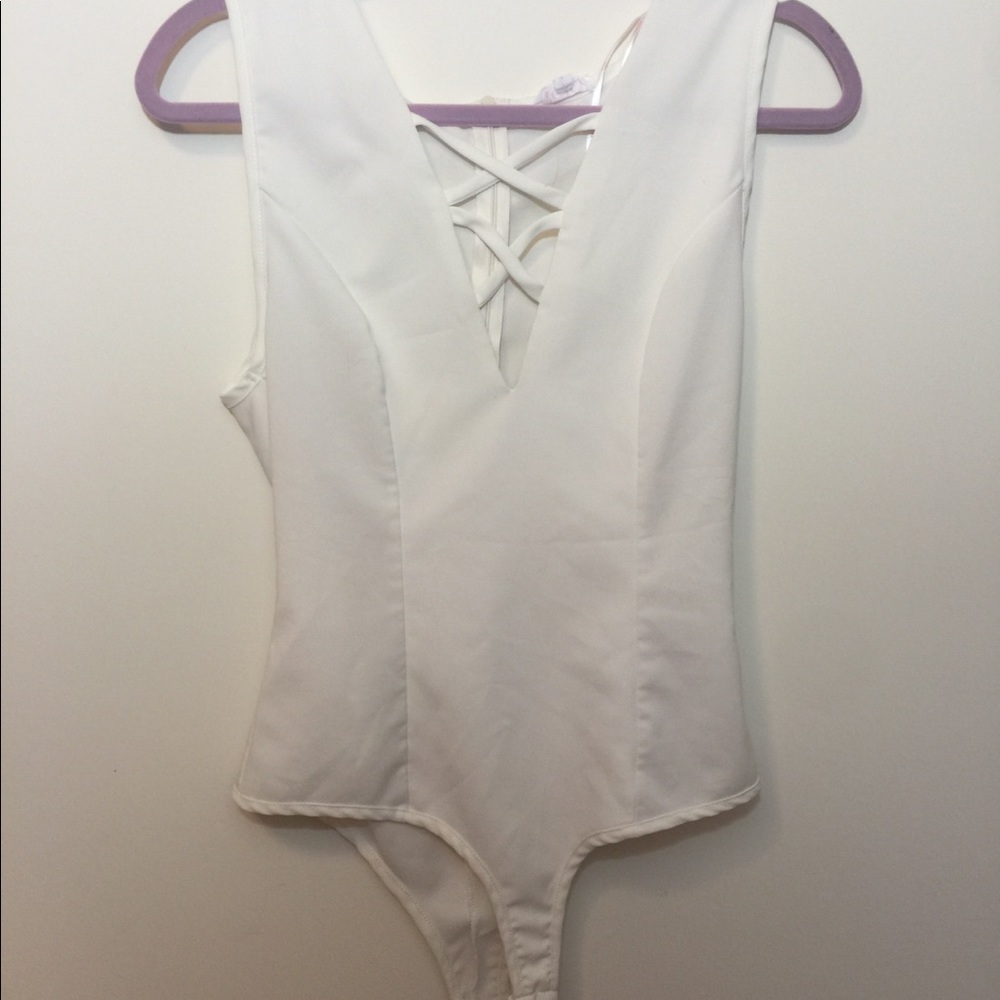 A’gaci white bodysuit!