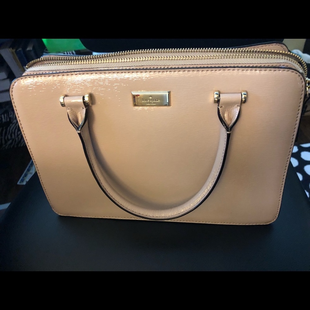 Kate spade lovely shiny material beige purse ;)