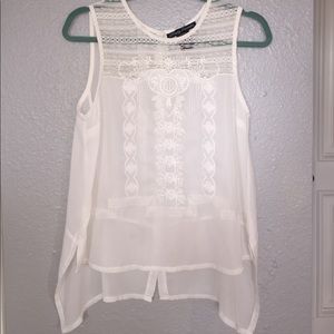 Sleeveless top with button up back