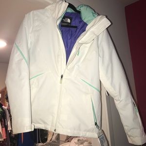 White north face small ski/snow board jacket.