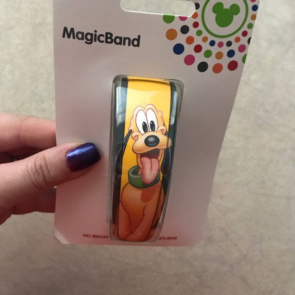 Brand new Pluto magic band Disney retired