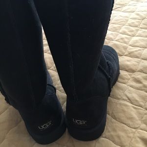 UGG classic tall fur lined black boots.